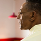 Gus Fring closeup in profile inside Los Pollos Hermando